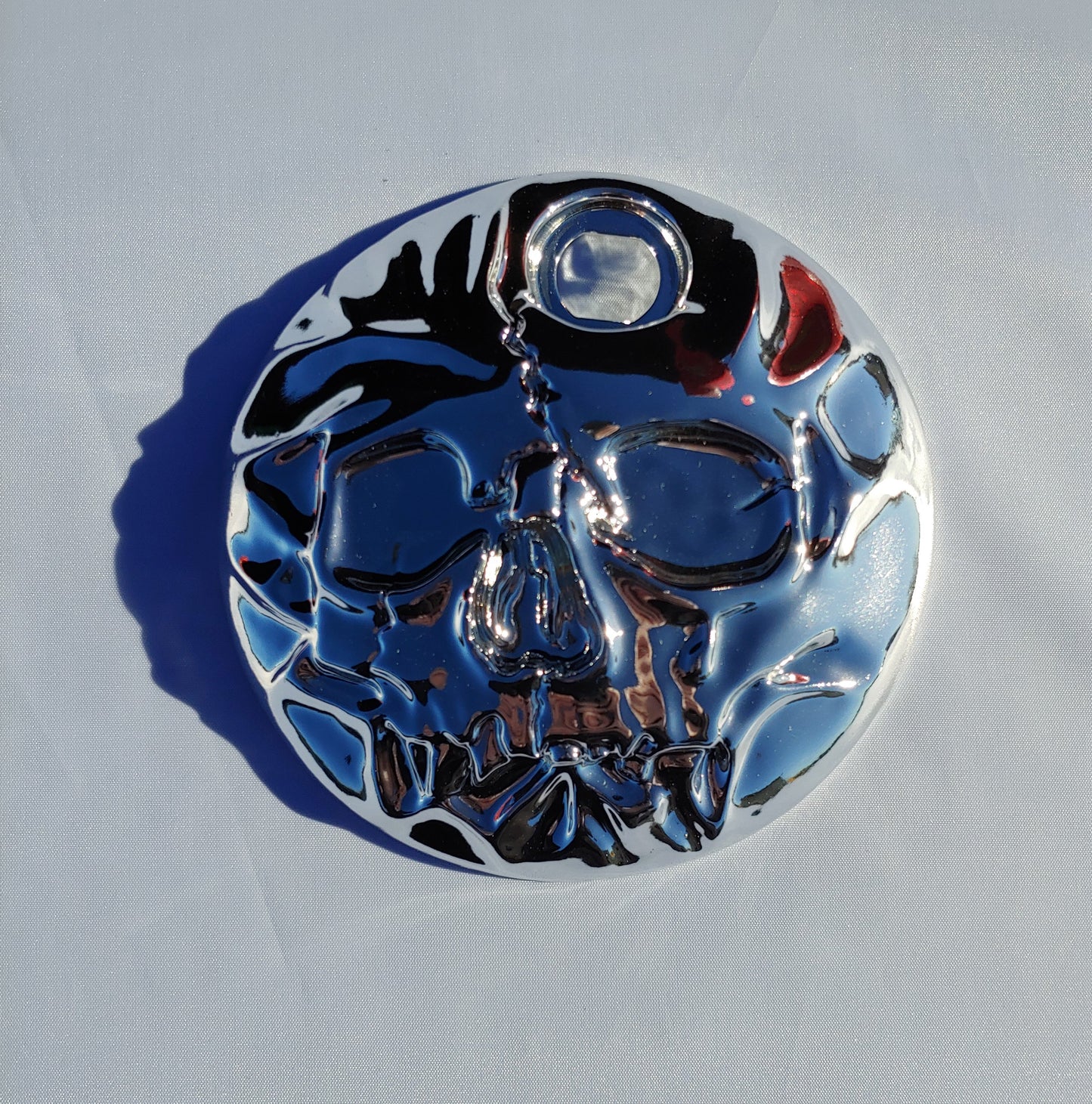 3D skull stretching on Chrome Harley touring fuel door 08+