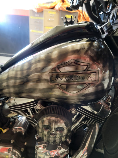 Stretched 6 gallon tank cover shrouds large emblem