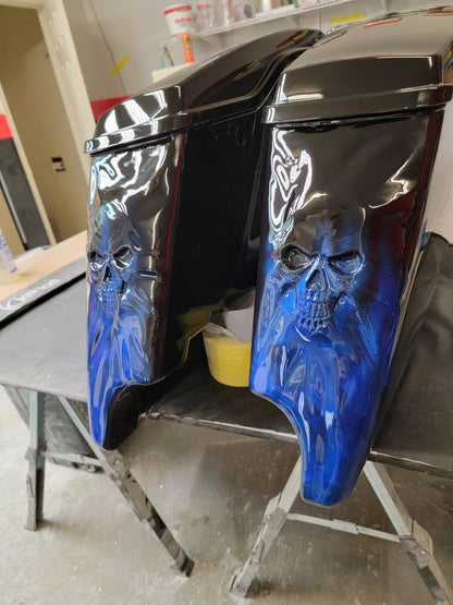 3D skulls stretching through stretched bags