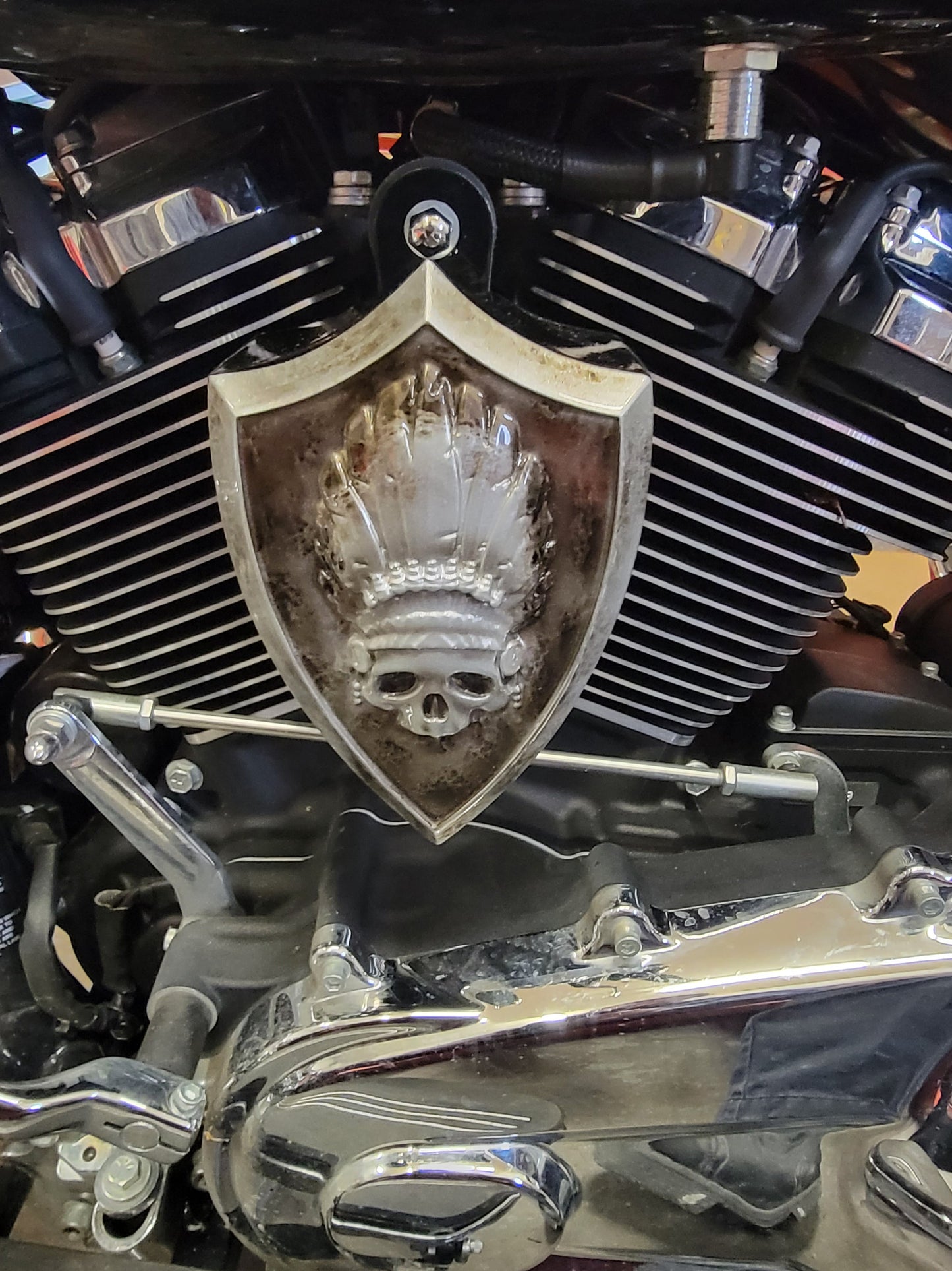 Side-mounted horn covers with skull warbonnet theme