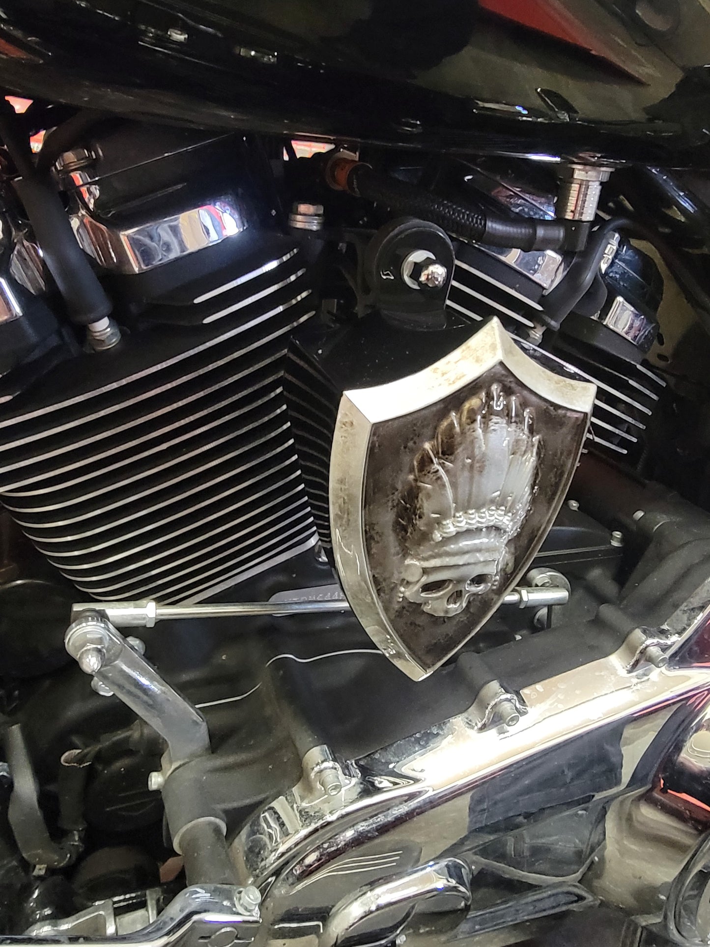 Side-mounted horn covers with skull warbonnet theme