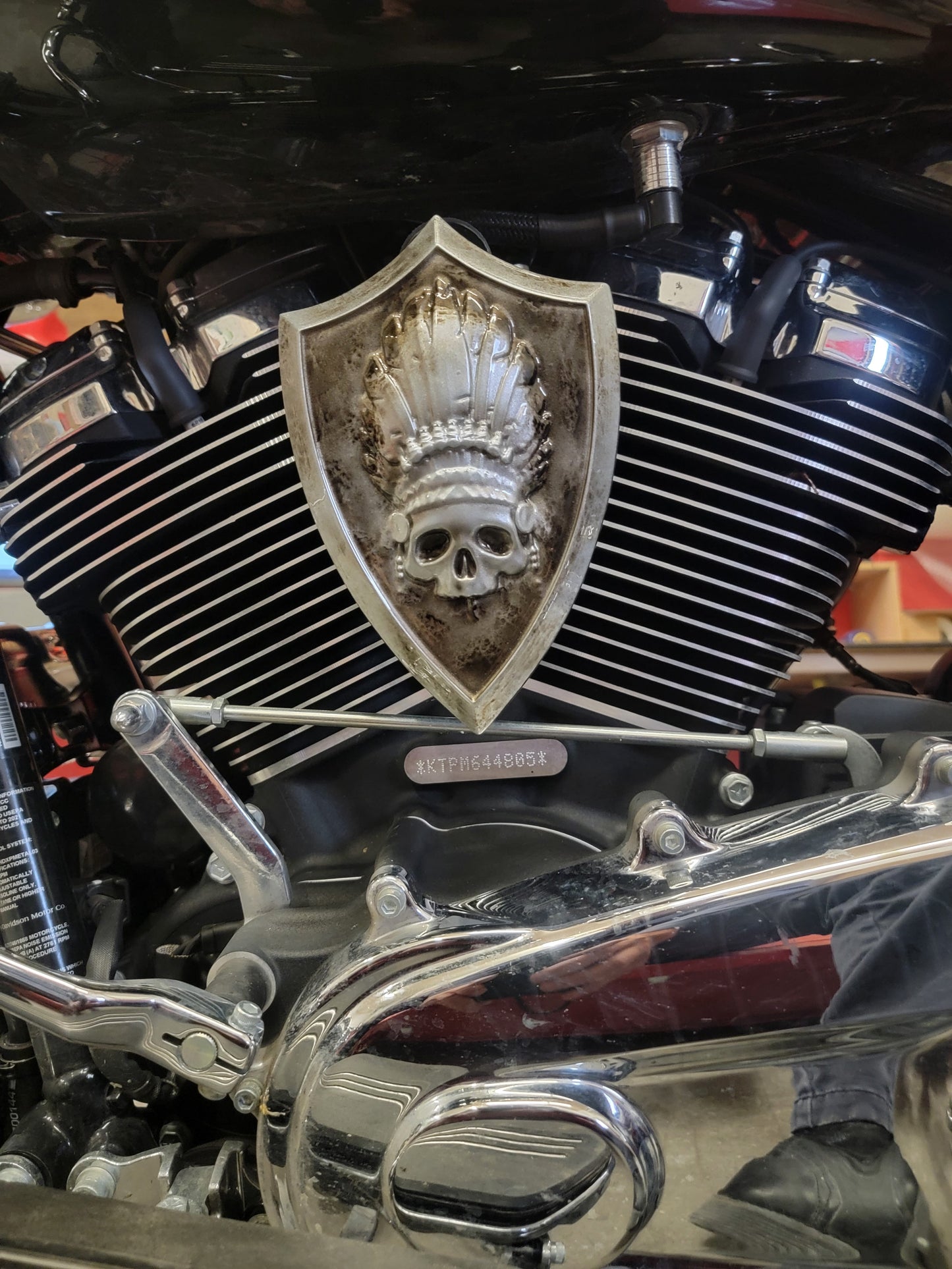 Side-mounted horn covers with skull warbonnet theme