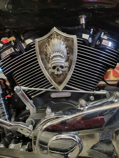 Side-mounted horn covers with skull warbonnet theme