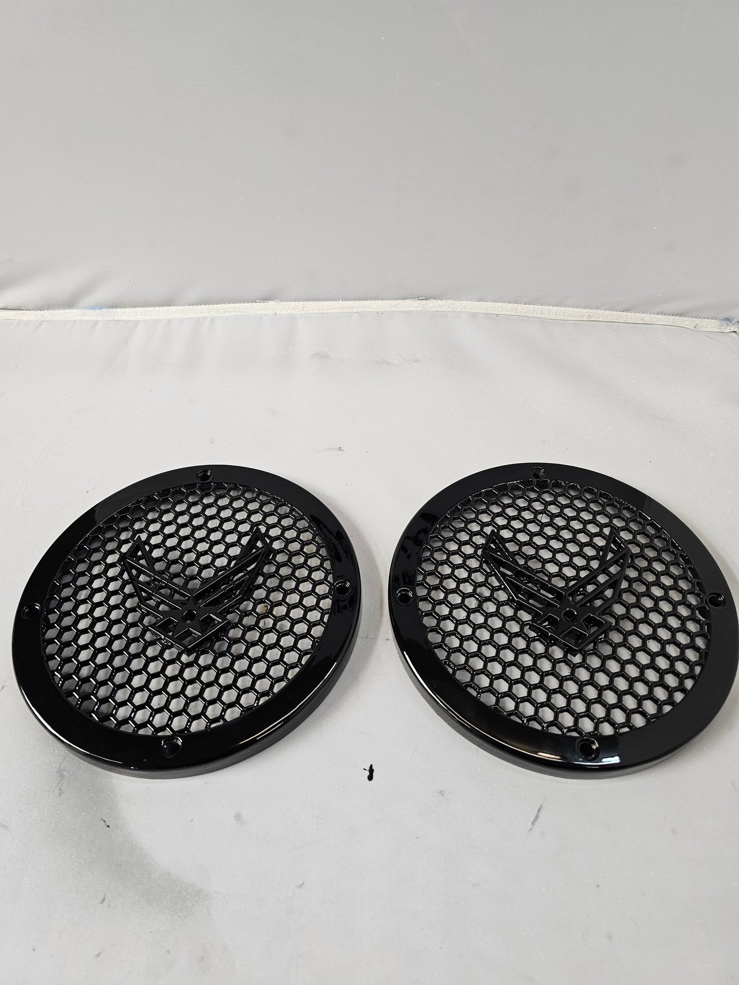 A set of Air Force 14-23 Harley Davidson Touring Pack Speaker Grill Cover Guard