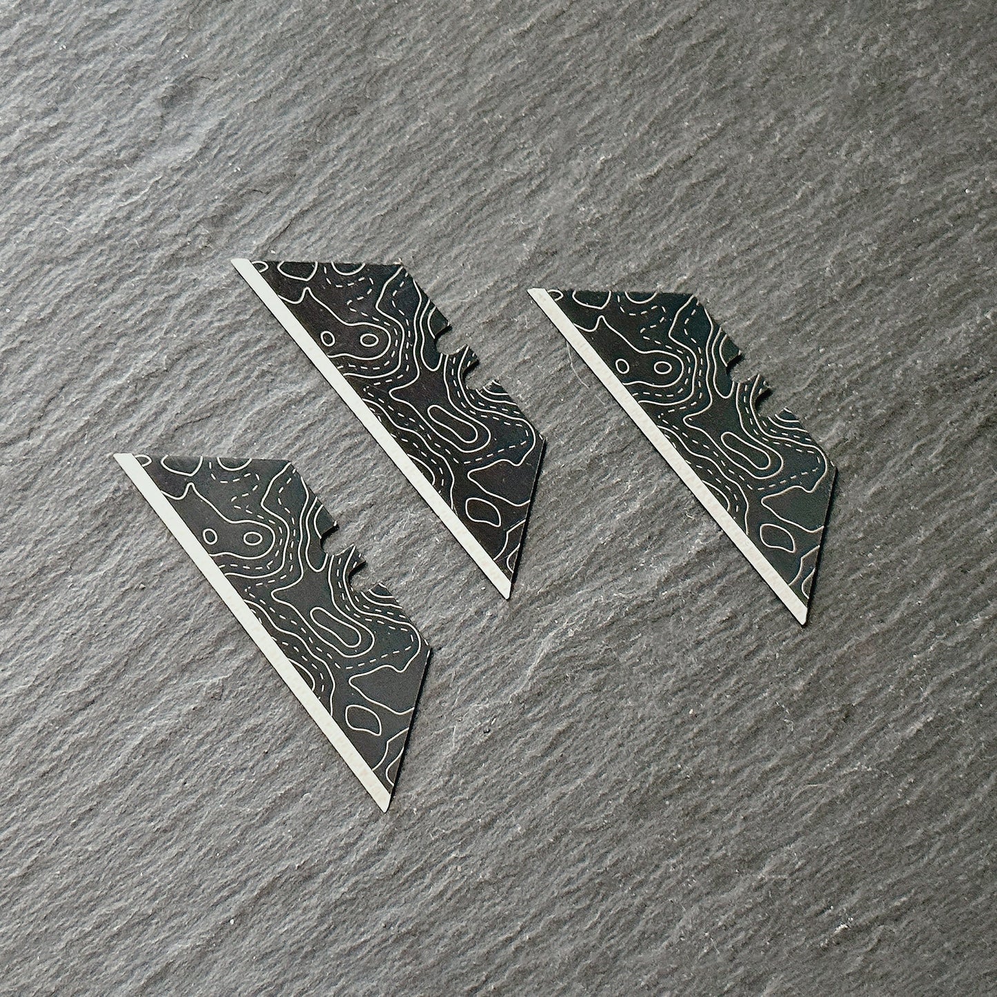 Stinger Laser Engraved Utility Blades, Utility Tool Replacements - Black Topographic Style (Trapezoid 3 pcs - Black)