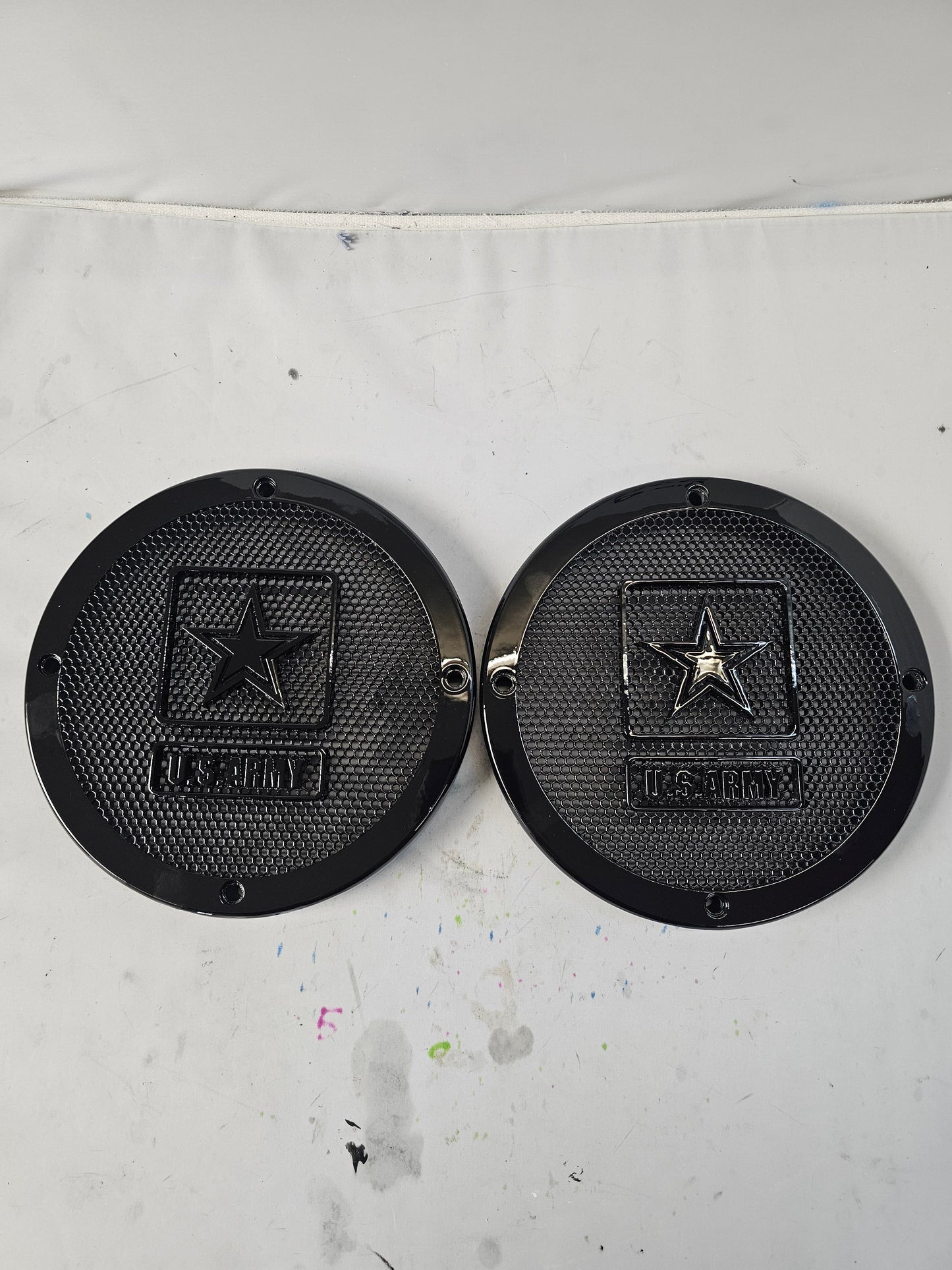 A set of Army speakers grill covers